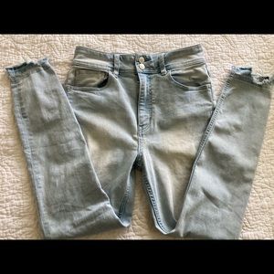 We the Free High Rise Light wash raw hem jeans